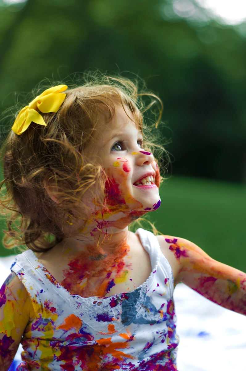 Photo by Senjuti Kundu girl with paint of body